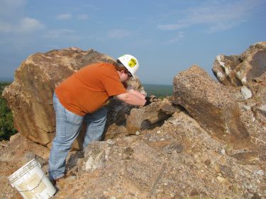 Me collecting at the Kyanite Mining Corporations  Willis Mountain Mine, in Buckingham County, VA. September 19, 2009.